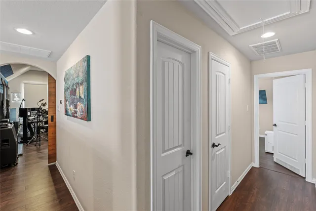 a view of a livingroom with furniture and a flat screen tv