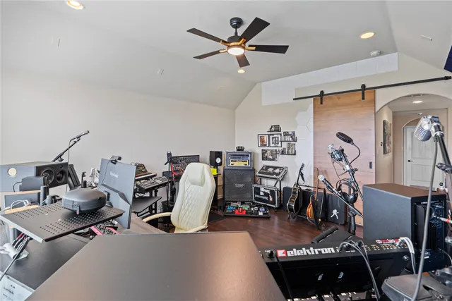 a bathroom with a double vanity sink toilet and a mirror