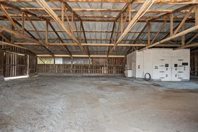 a big room with palm trees