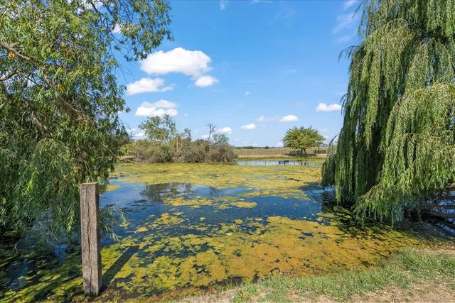 a view of a lake with outdoor space
