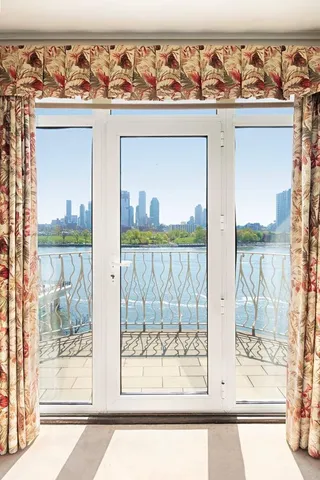 a view of a window with a view of the front door