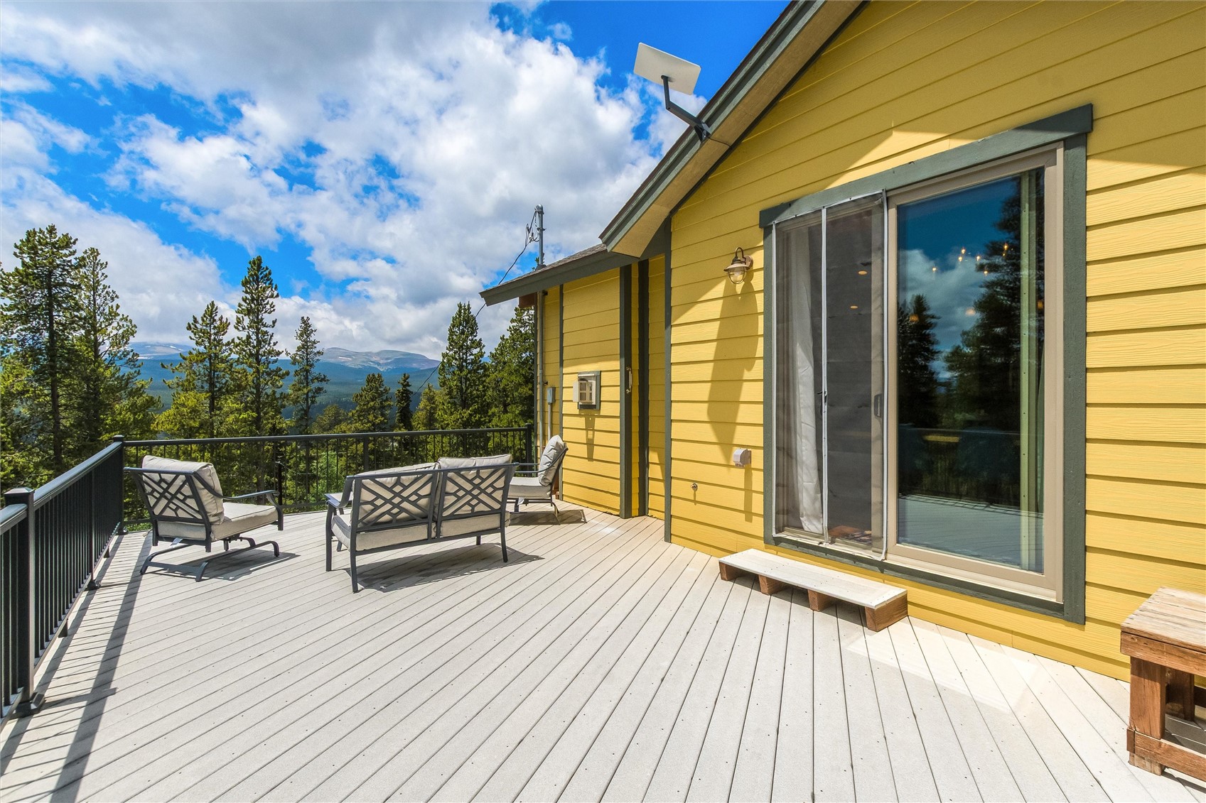 592 Ponderosa Road Fairplay, CO 80440 - Photo 1 of 45 a balcony with furniture and wooden floor