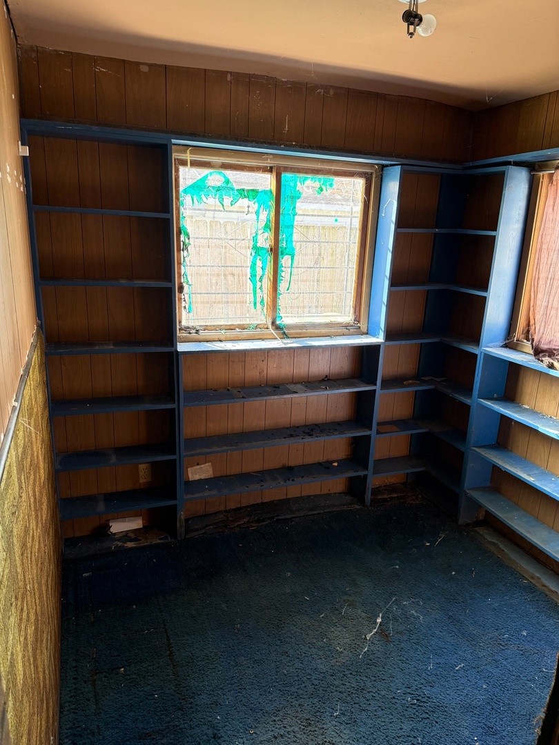 17226 Community Street Lansing, IL 60438 - Photo 18 of 25 a view of walk in closet