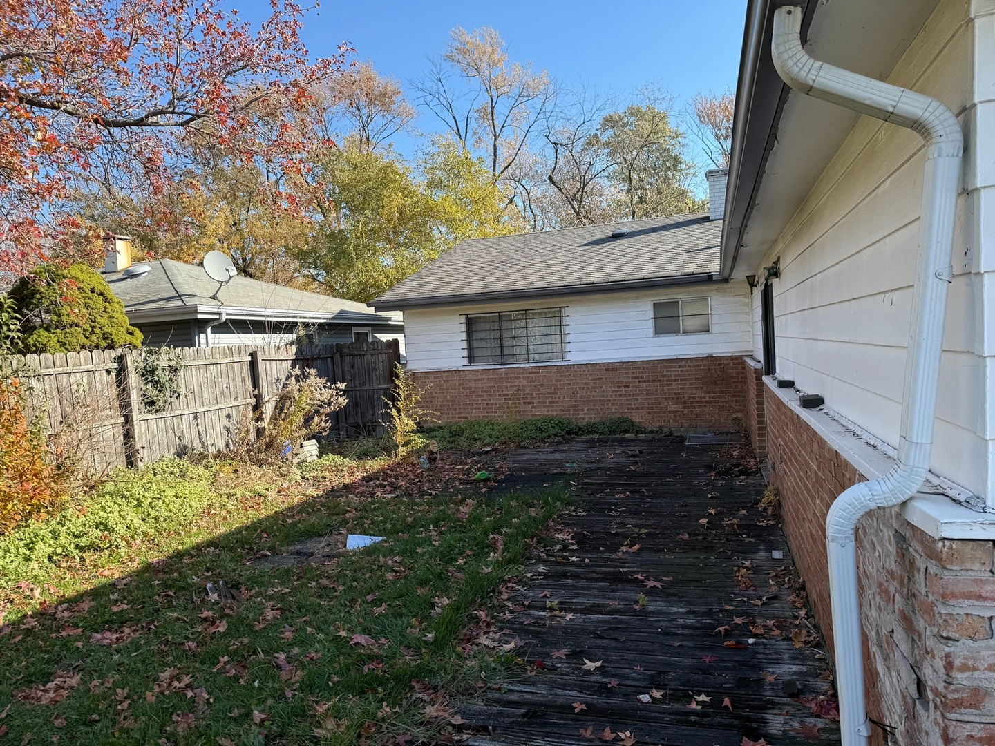 17226 Community Street Lansing, IL 60438 - Photo 24 of 25 a view of a house with a yard