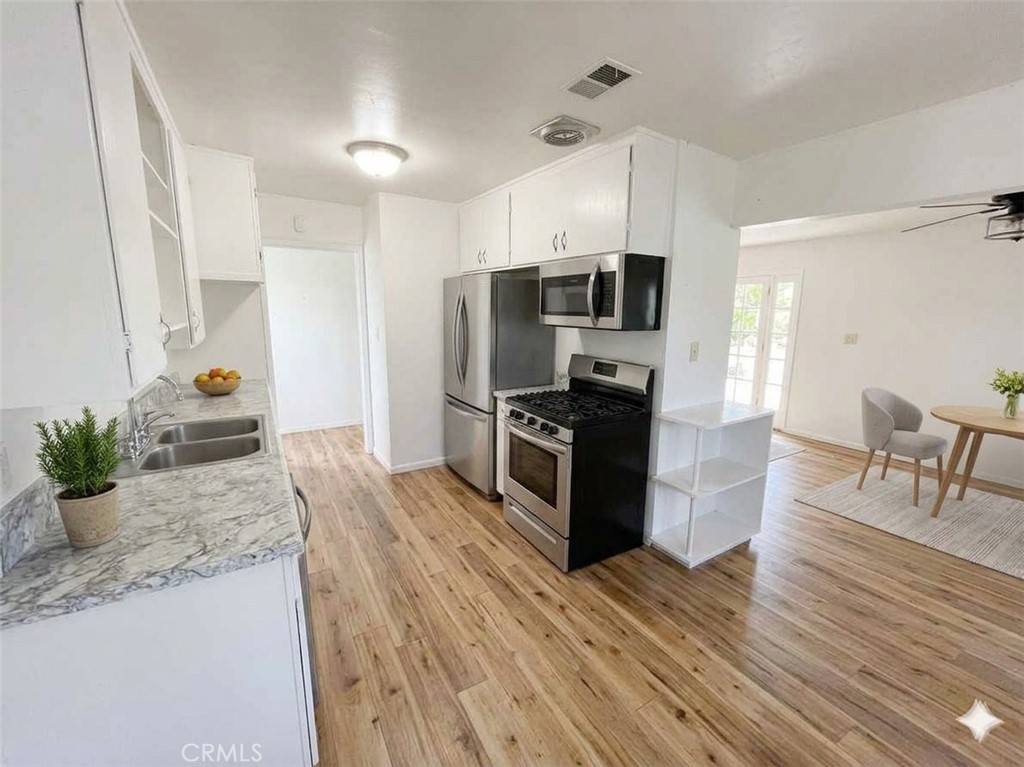 8868 Randolph Street Riverside, CA 92503 - Photo 7 of 21 Digitally enhanced artist's rendering of potential kitchen