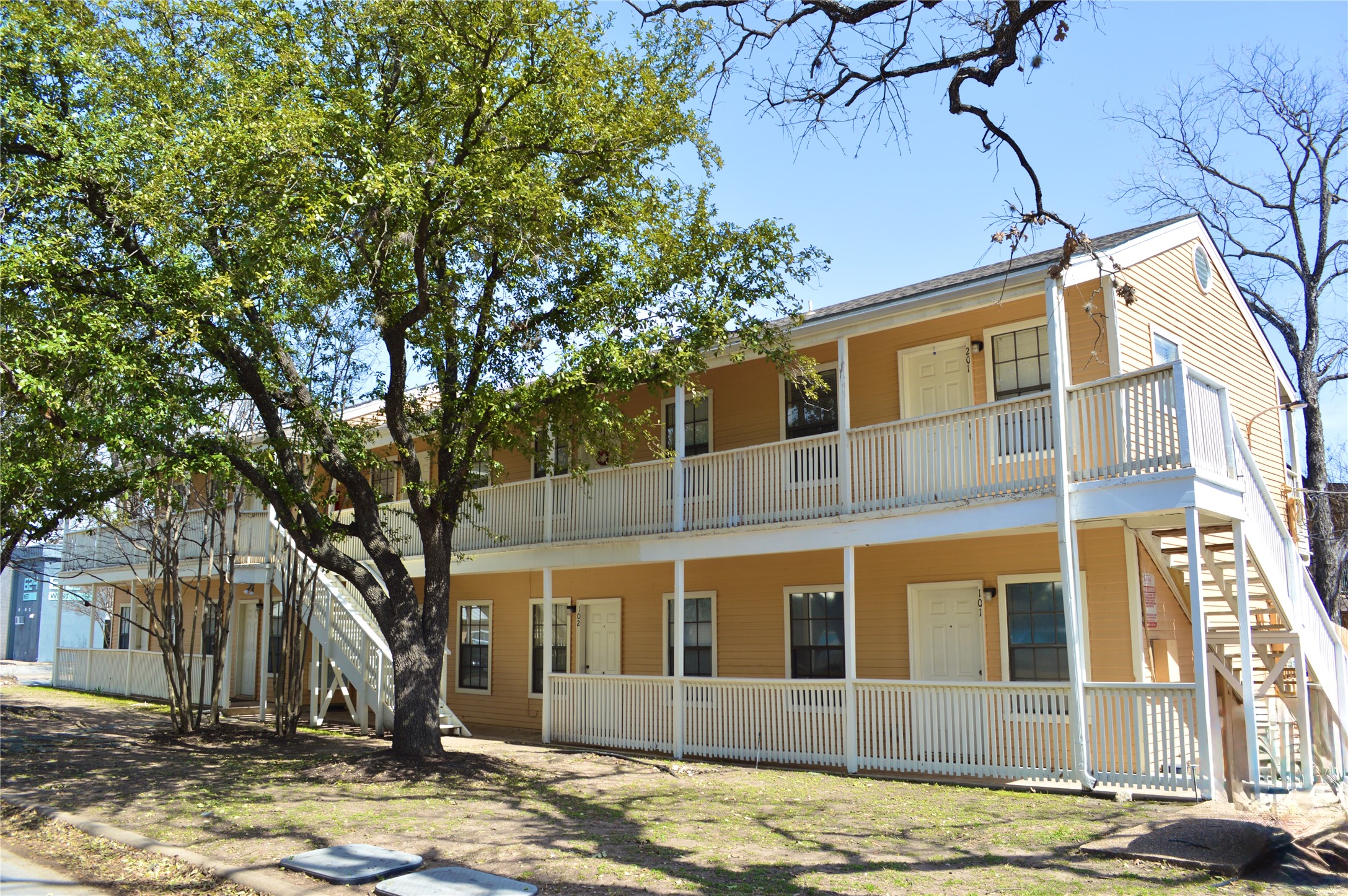 621 West 37th Street, Unit 103 Austin, TX 78705 - Photo 2 of 8 View of property featuring stairway