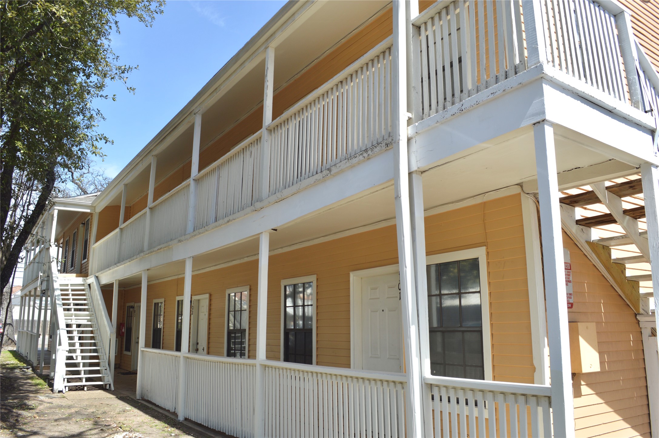 621 West 37th Street, Unit 103 Austin, TX 78705 - Photo 8 of 8 View of building exterior with stairway
