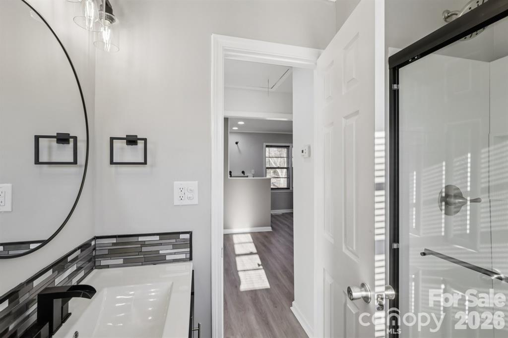 3207 Valley Dale Road Monroe, NC 28110 - Photo 15 of 27 a view of a hallway with wooden floor and entryway