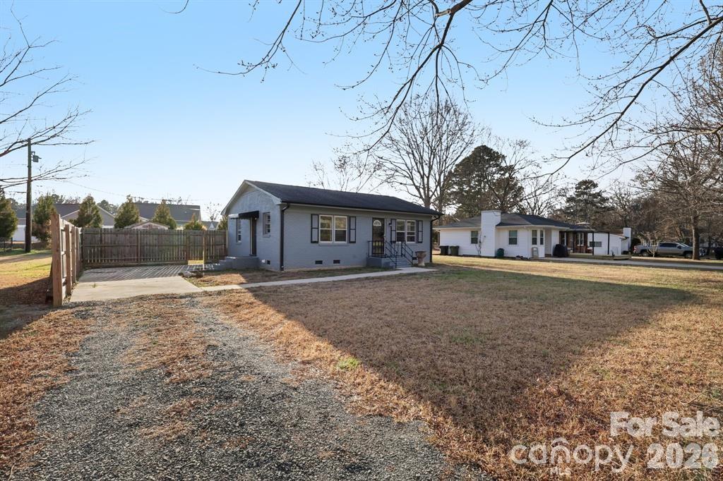 3207 Valley Dale Road Monroe, NC 28110 - Photo 2 of 27 a view of a house with a yard
