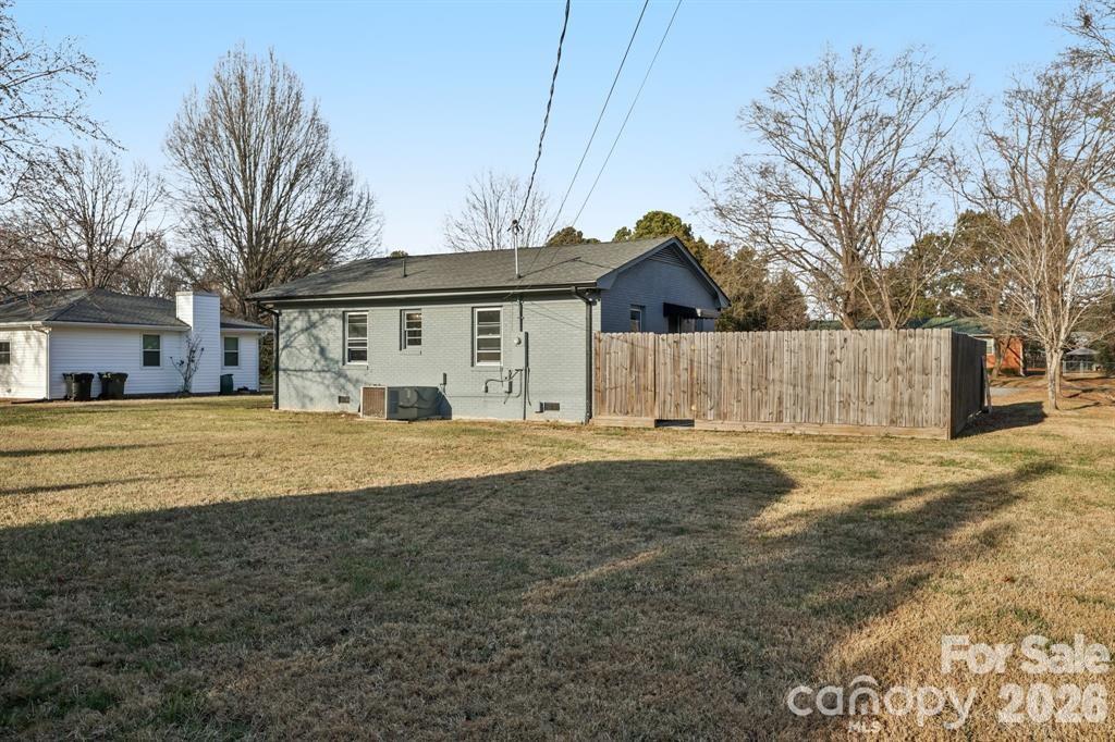 3207 Valley Dale Road Monroe, NC 28110 - Photo 23 of 27 a front view of a house with a yard and garage