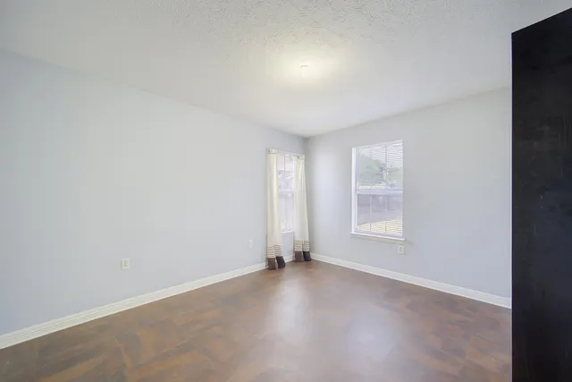 an empty room with windows