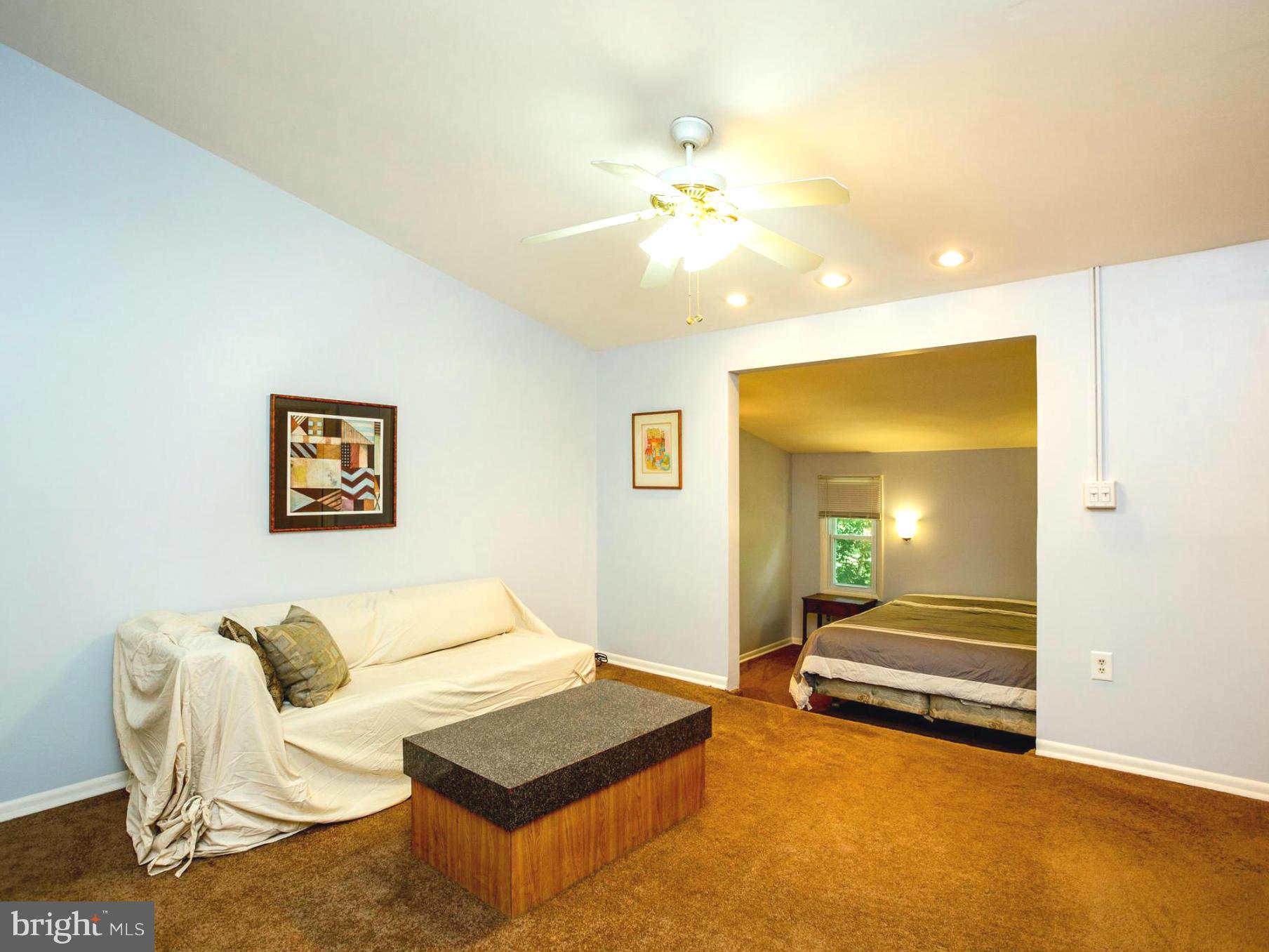 7312 Kathydale Road Pikesville, MD 21207 - Photo 14 of 30 Large master bedroom with sitting area