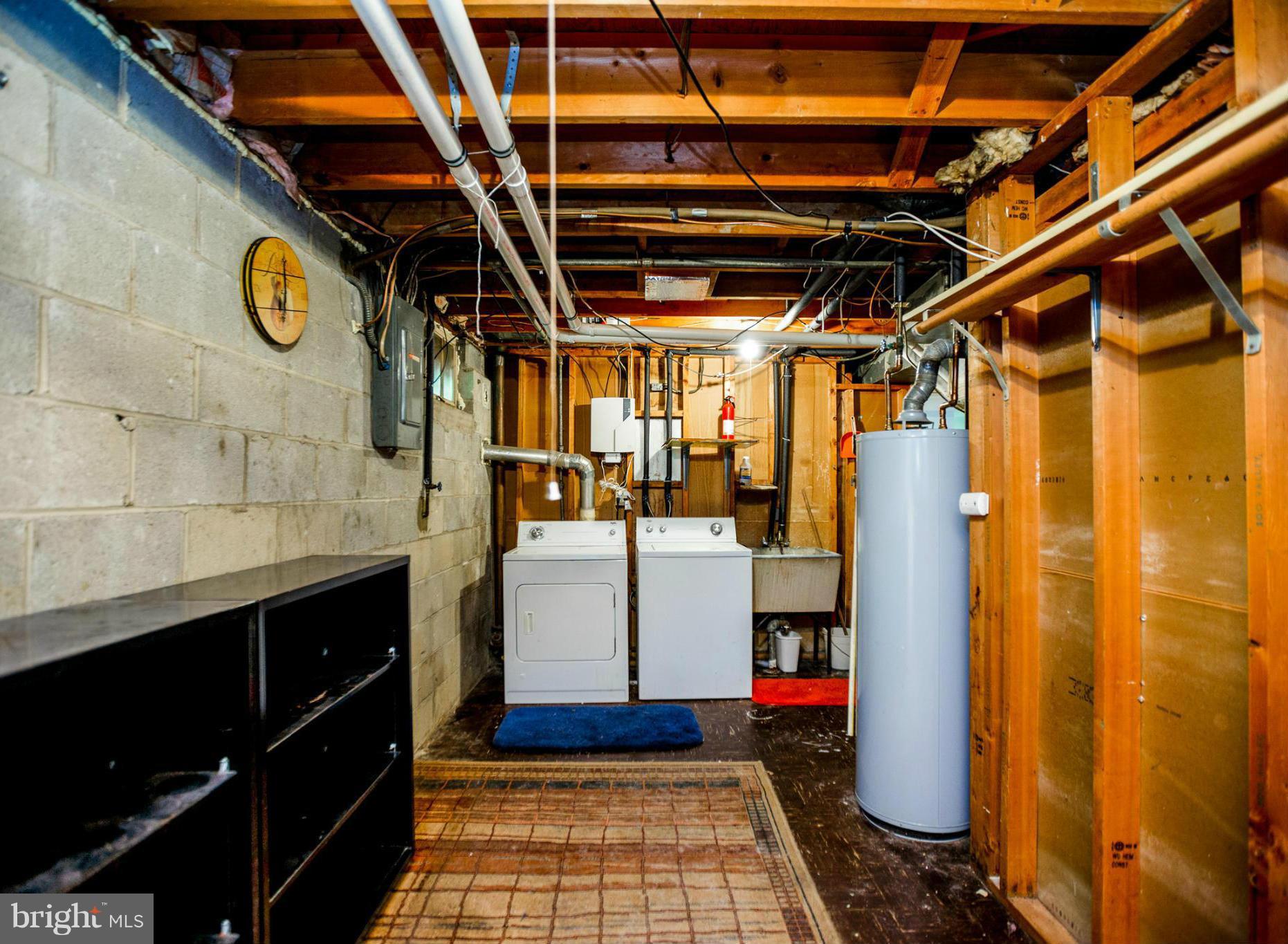 7312 Kathydale Road Pikesville, MD 21207 - Photo 26 of 30 Laundry room with tons of storage space