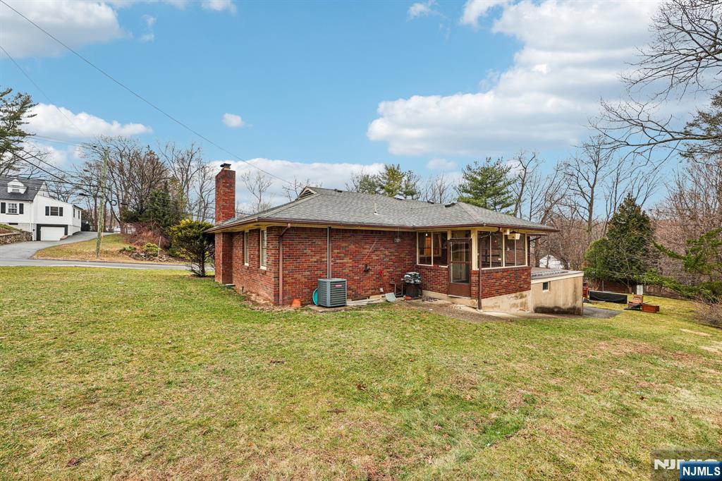 84 Squaw Brook Road North Haledon, NJ 07508 - Photo 19 of 23 a view of a house with a yard