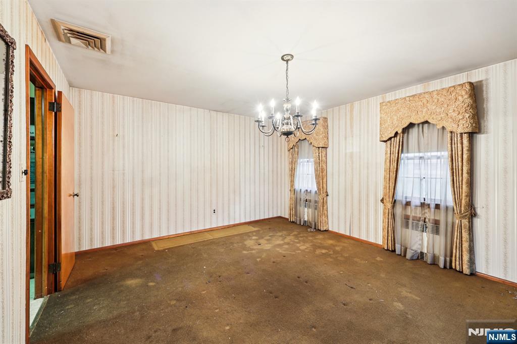 84 Squaw Brook Road North Haledon, NJ 07508 - Photo 5 of 23 a view of a livingroom with a staircase