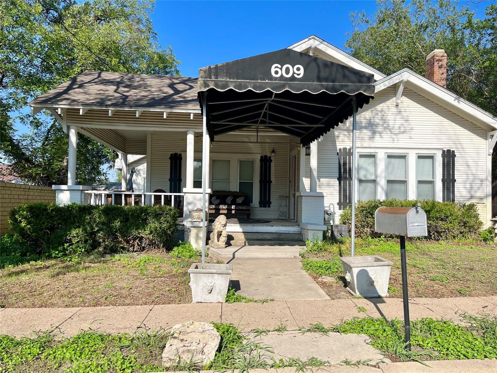 609 North Mary Street Comanche, TX 76442 - Photo 1 of 1 a view of a dinning table and chairs in patio
