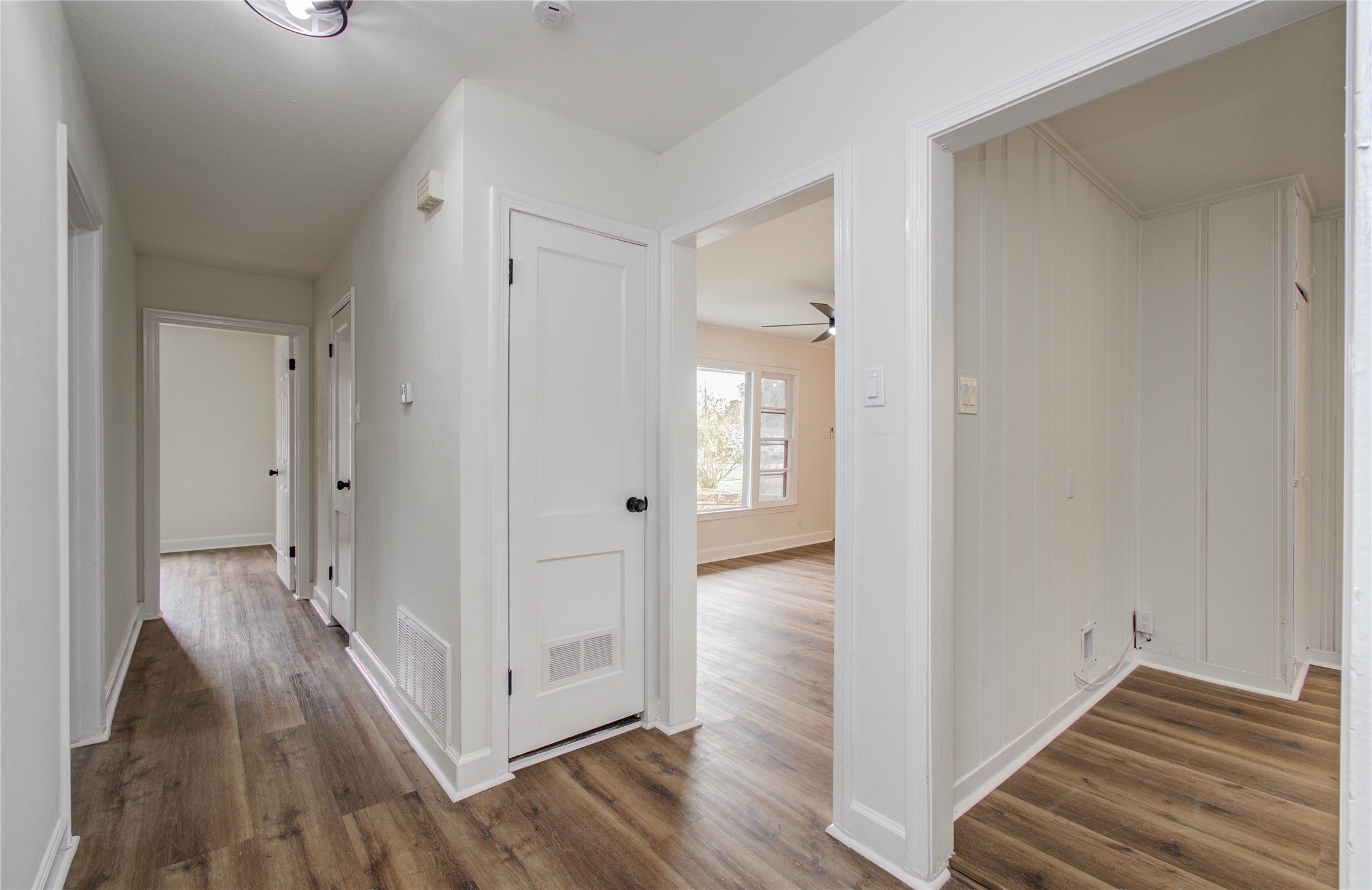 2417 Pecan Street Dickinson, TX 77539 - Photo 38 of 43 a view of a hallway with wooden floor and staircase