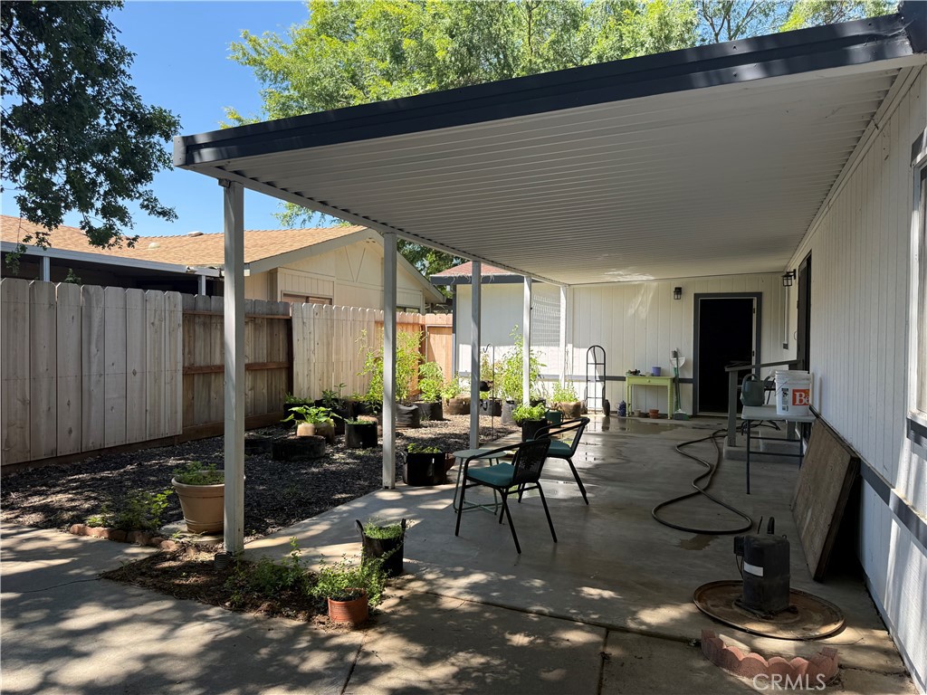 3835 Gardiner Ferry Road, Unit 98 Corning, CA 96021 - Photo 10 of 11 a view of living room filled with furniture and outdoor seating