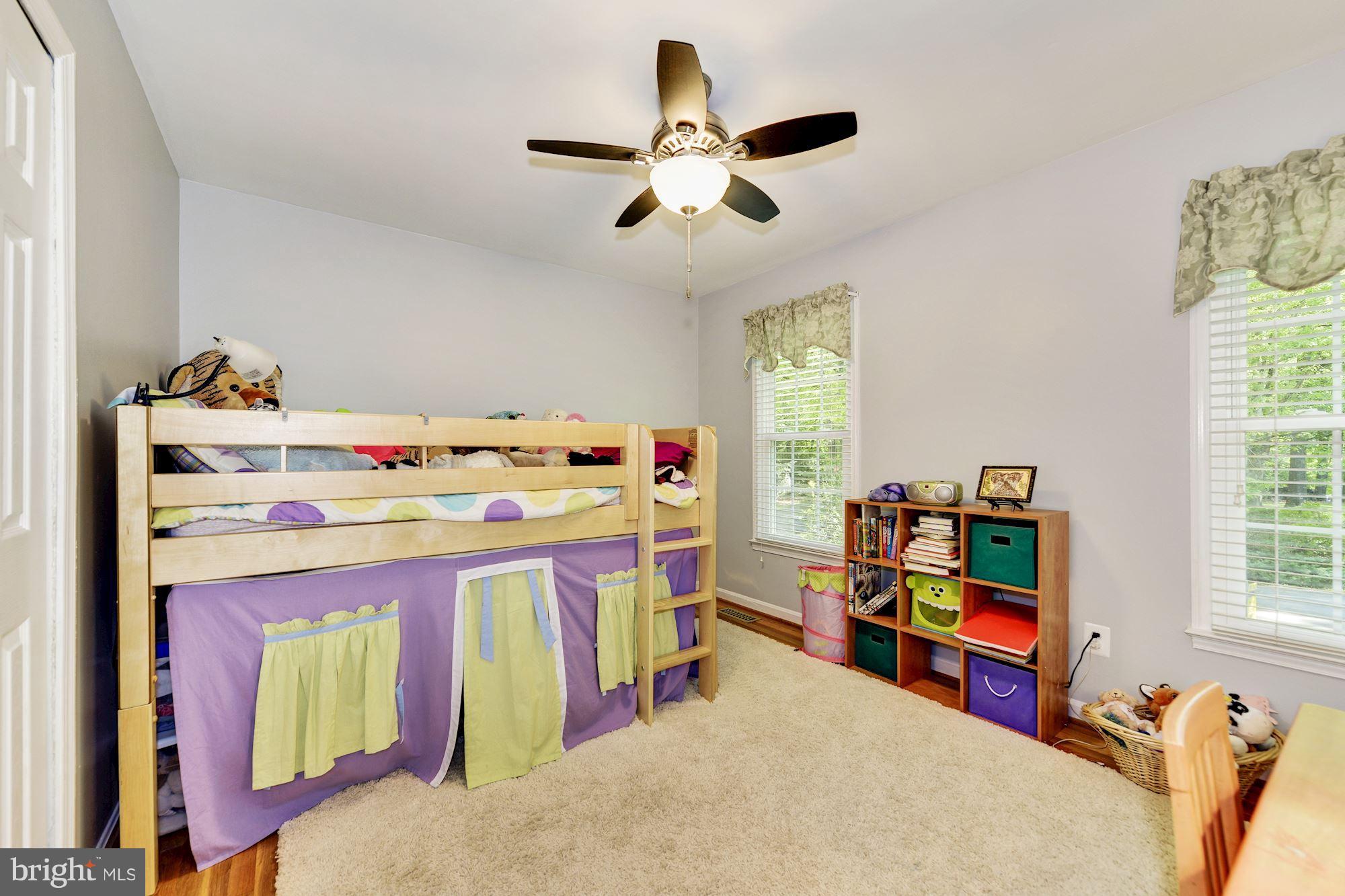 11603 Clipstone Lane Reston, VA 20191 - Photo 19 of 30 a utility room with dryer washer and a view of living room
