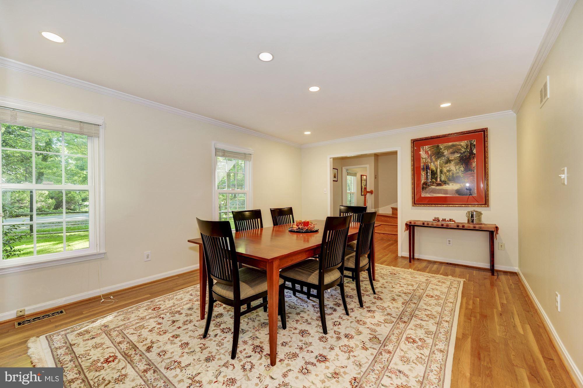 11603 Clipstone Lane Reston, VA 20191 - Photo 3 of 30 a view of a dining room with furniture and wooden floor