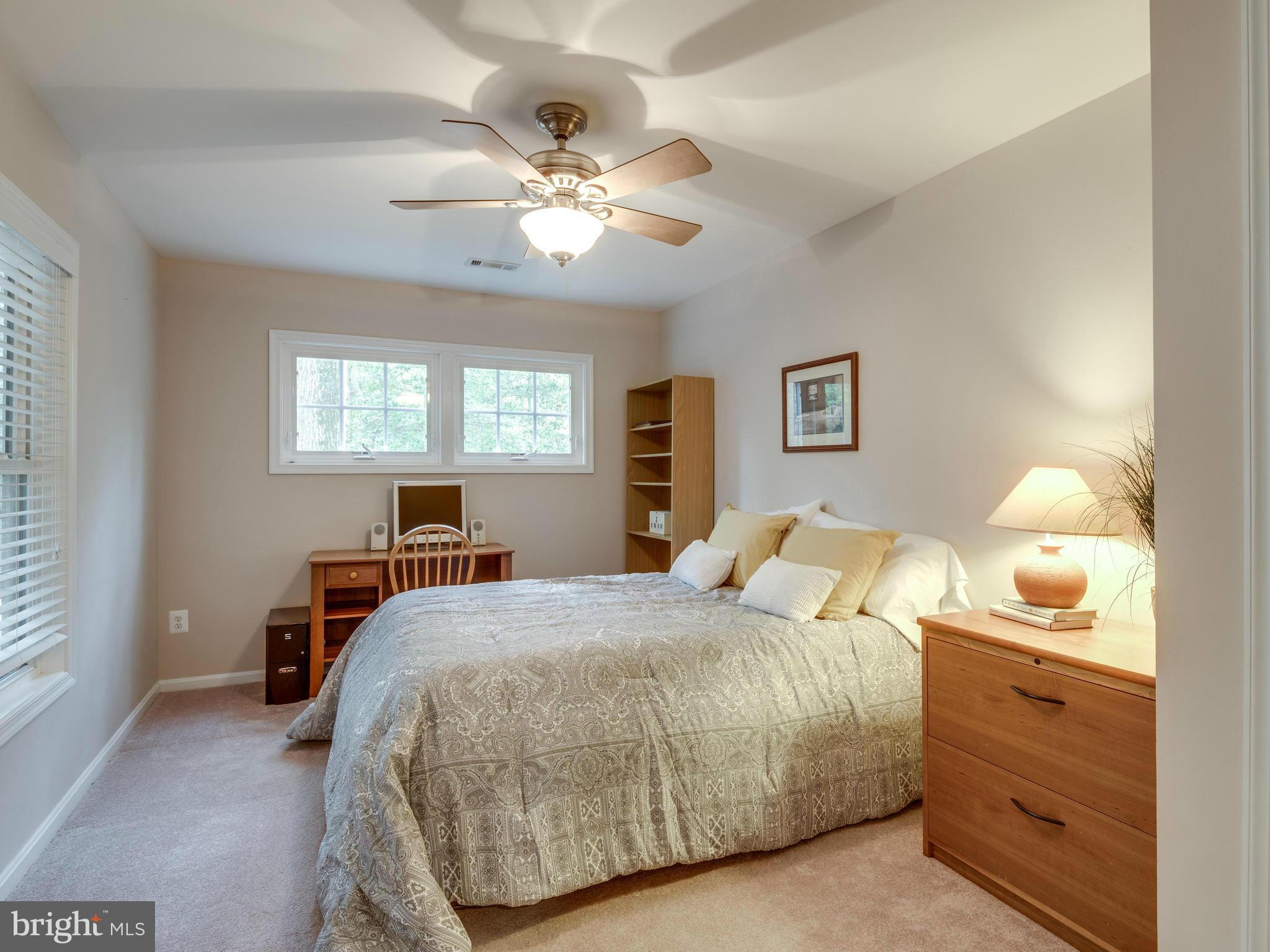 11603 Clipstone Lane Reston, VA 20191 - Photo 24 of 30 a bedroom with a bed and window