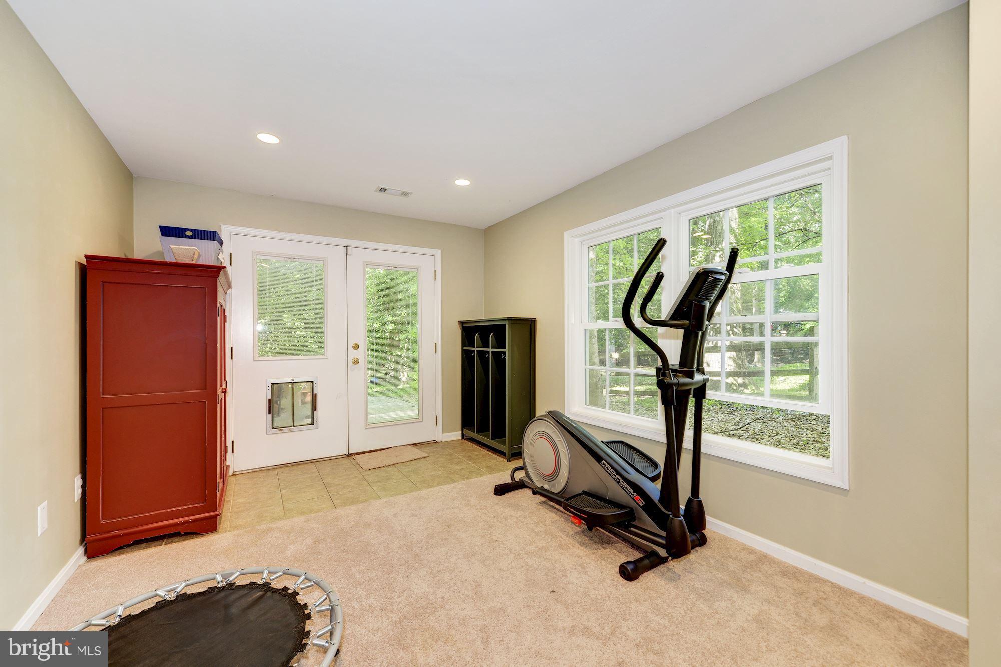 11603 Clipstone Lane Reston, VA 20191 - Photo 25 of 30 a view of a room with gym equipment