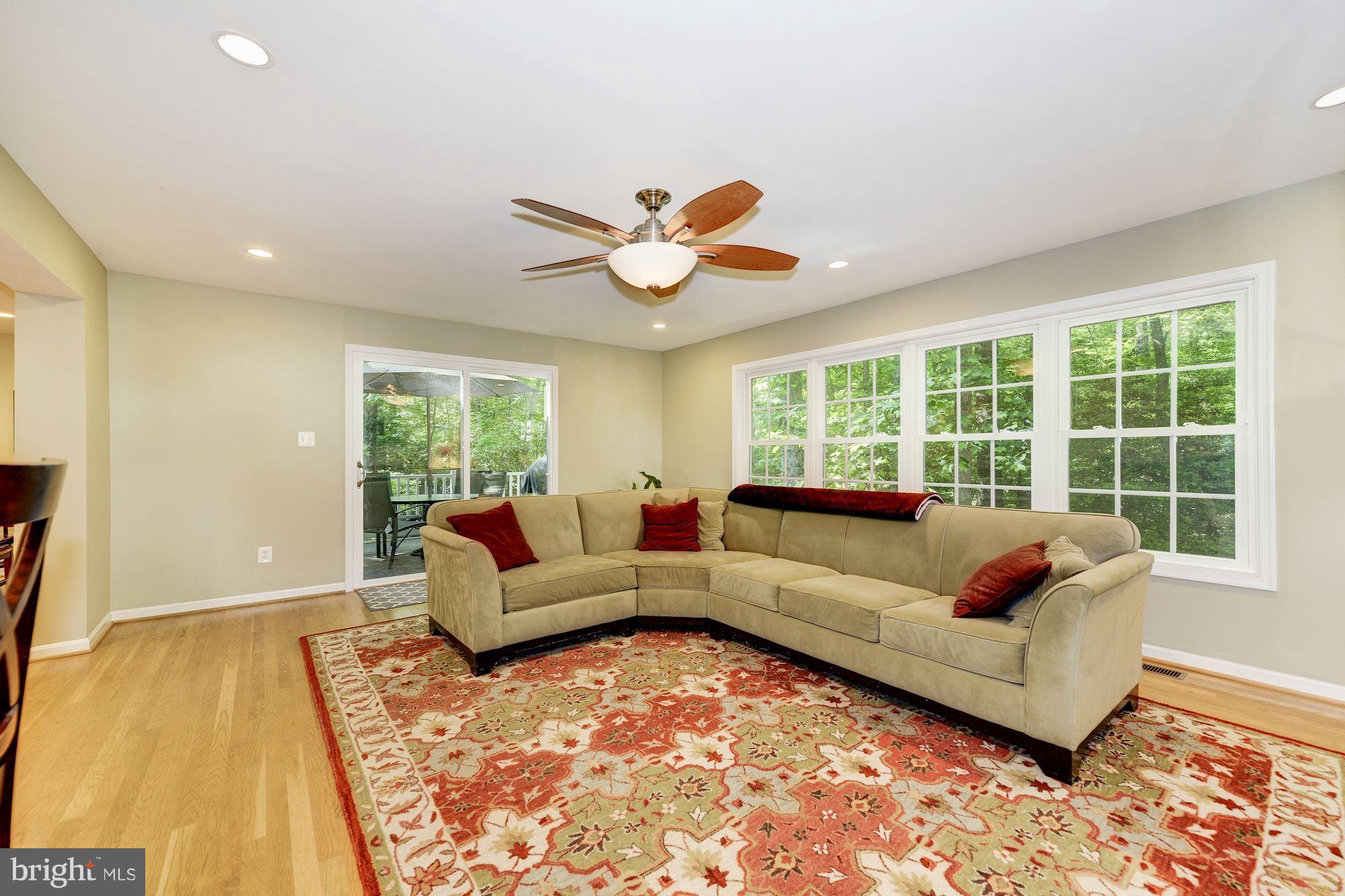 11603 Clipstone Lane Reston, VA 20191 - Photo 10 of 30 a living room with furniture and a large window