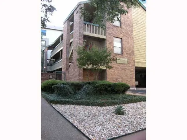 a front view of a house with yard