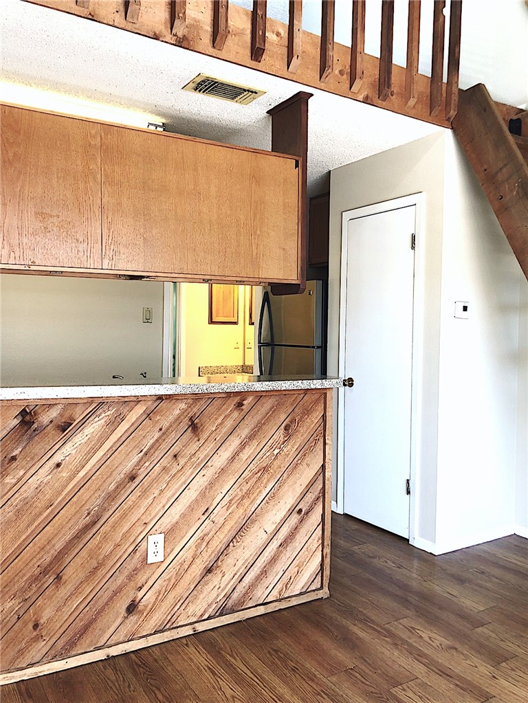2210 Pearl Street, Unit 304 Austin, TX 78705 - Photo 5 of 18 a view of a room with wooden floor