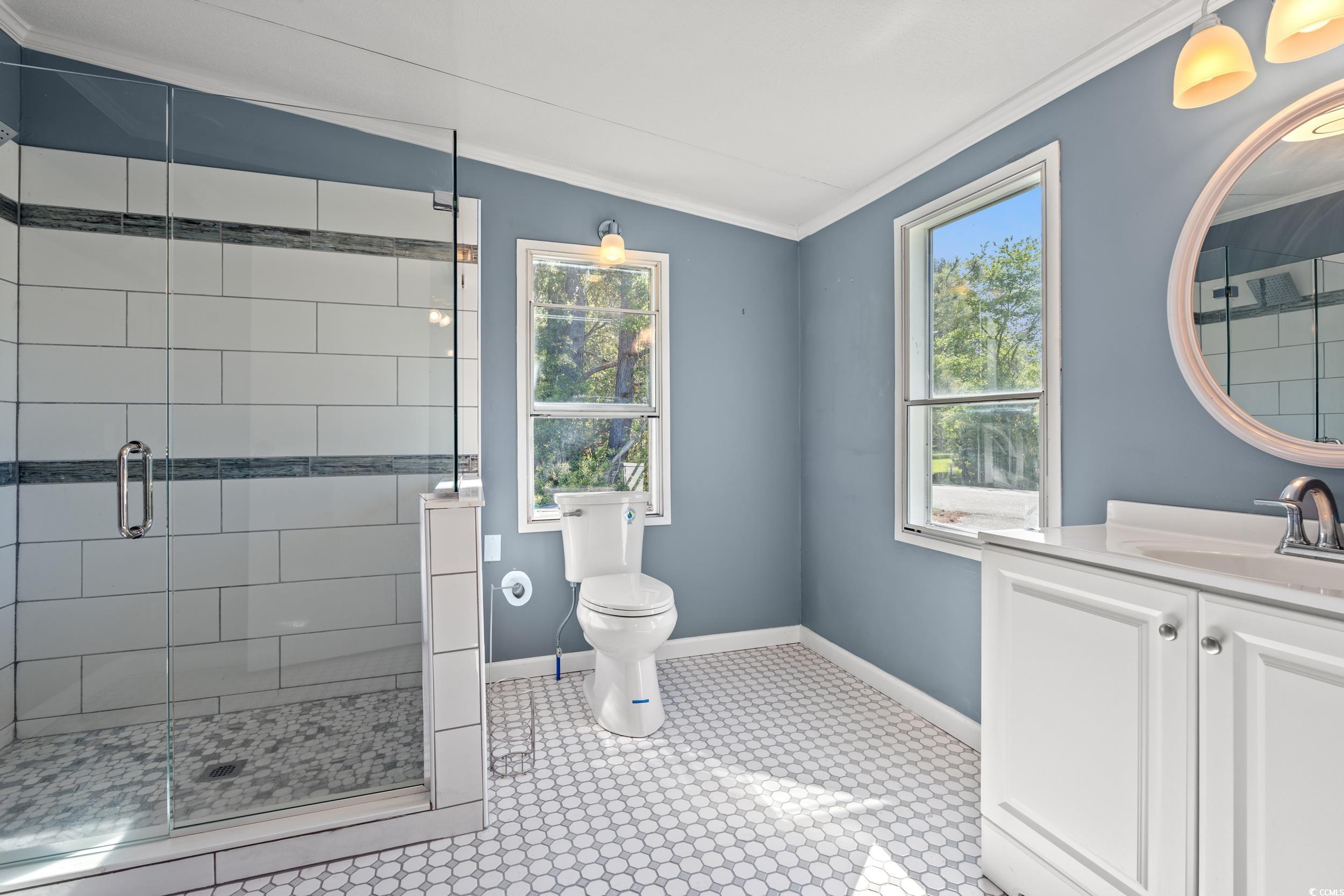 109 Diff Avenue Loris, SC 29569 - Photo 11 of 22 Full bath featuring a shower stall, baseboards, or