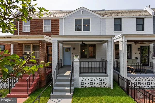 a front view of a house with a porch