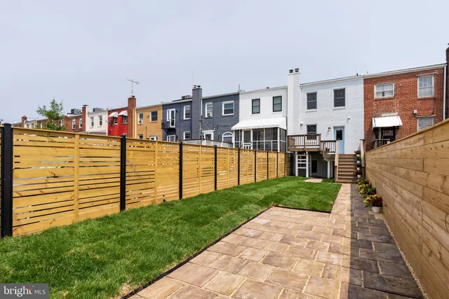 a front view of a building with glass windows