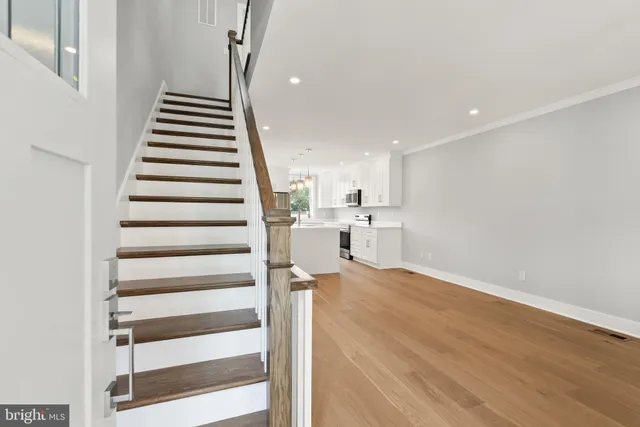a view of kitchen with wooden floor