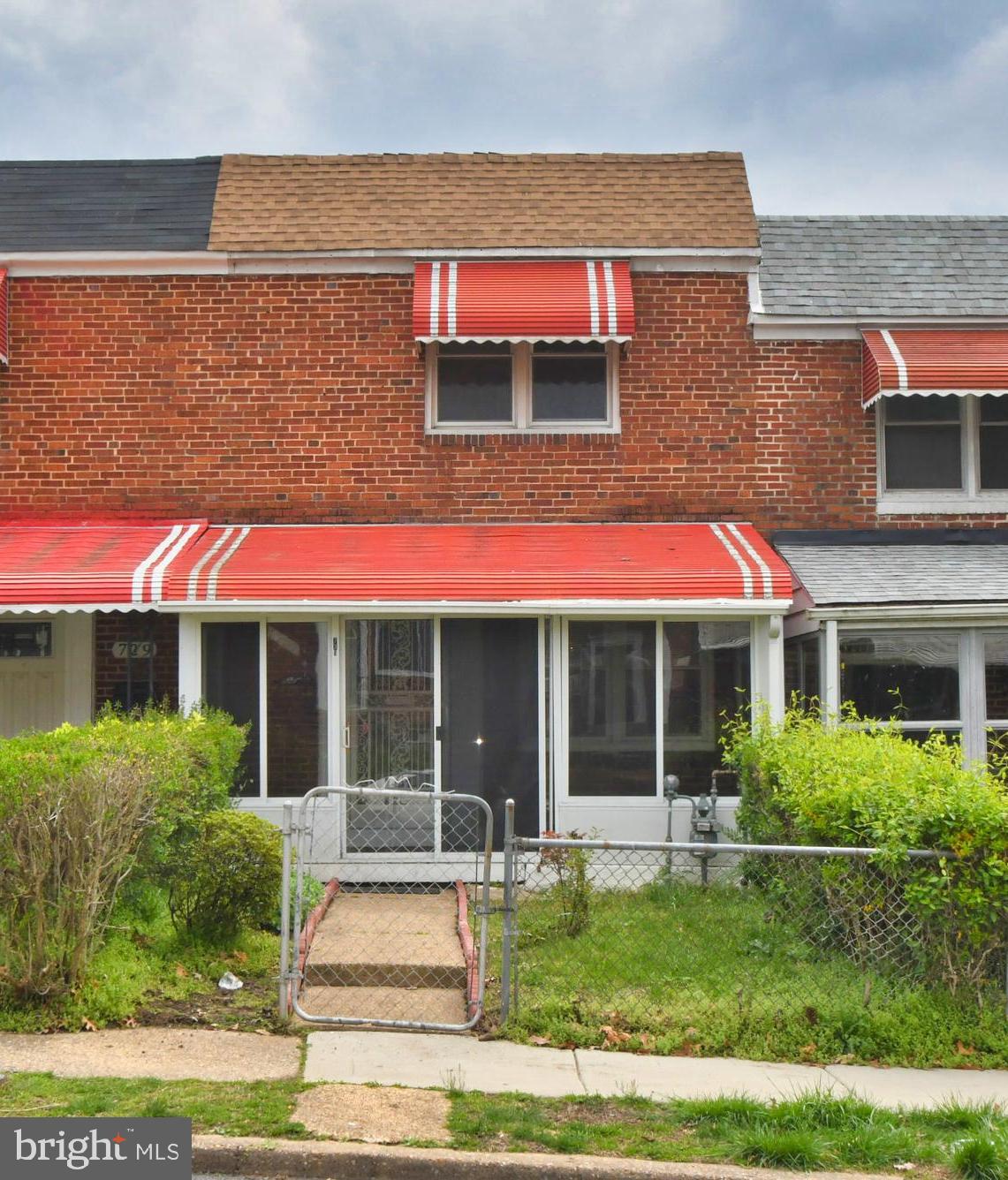 731 Roundview Road Baltimore, MD 21225 - Photo 1 of 40 a view front of houses with outdoor space