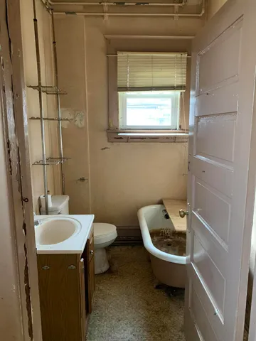 a bathroom with a sink and a toilet