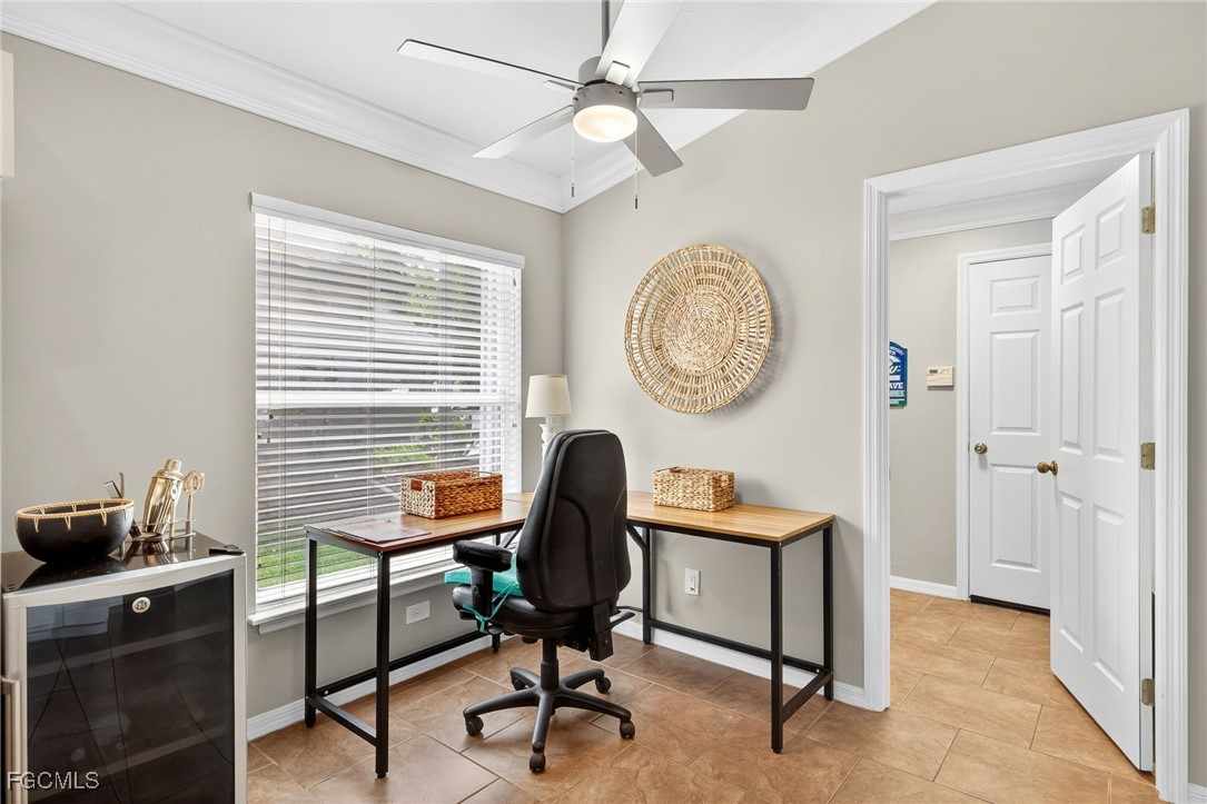 17974 Oakmont Ridge Circle Fort Myers, FL 33967 - Photo 13 of 35 a view of a workspace with furniture and a window