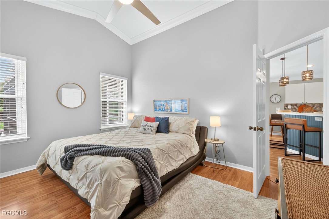 17974 Oakmont Ridge Circle Fort Myers, FL 33967 - Photo 14 of 35 a bedroom with a bed and a window