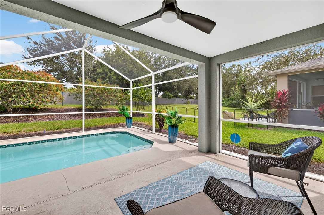 17974 Oakmont Ridge Circle Fort Myers, FL 33967 - Photo 23 of 35 a view of swimming pool with seating area and furniture