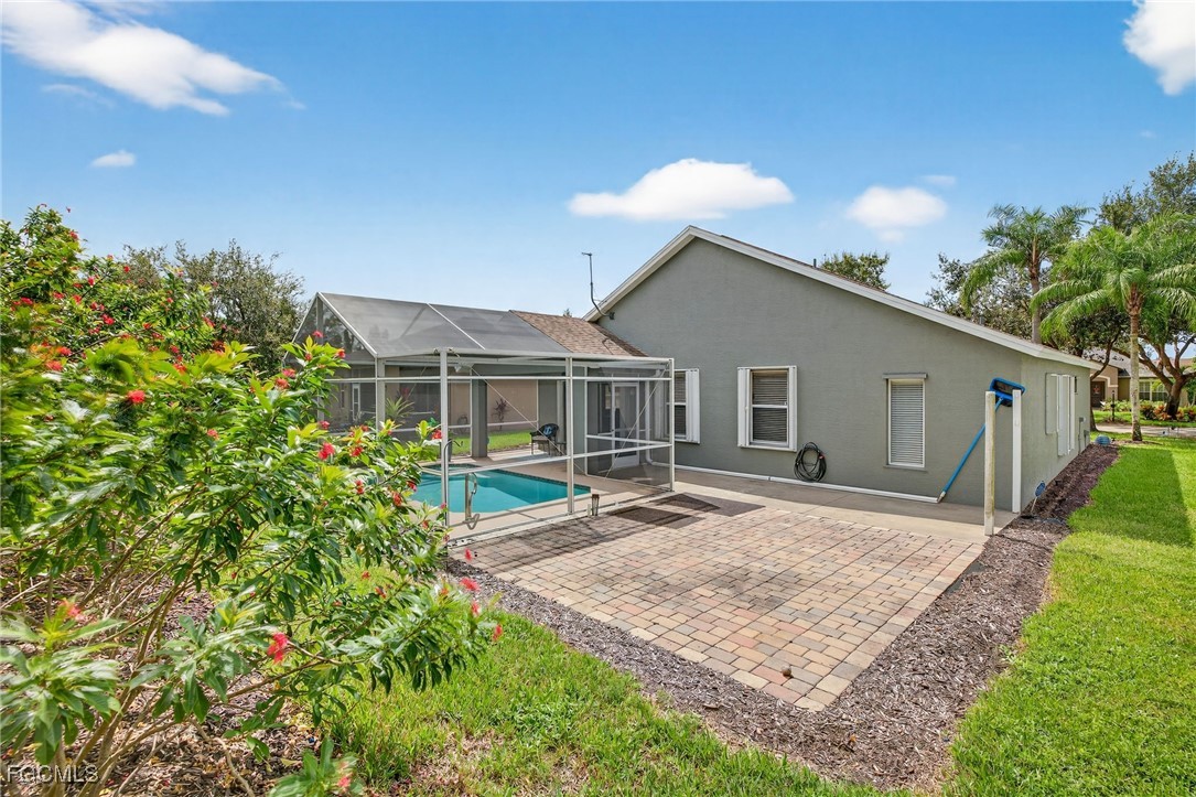17974 Oakmont Ridge Circle Fort Myers, FL 33967 - Photo 26 of 35 a view of a house with backyard and sitting area