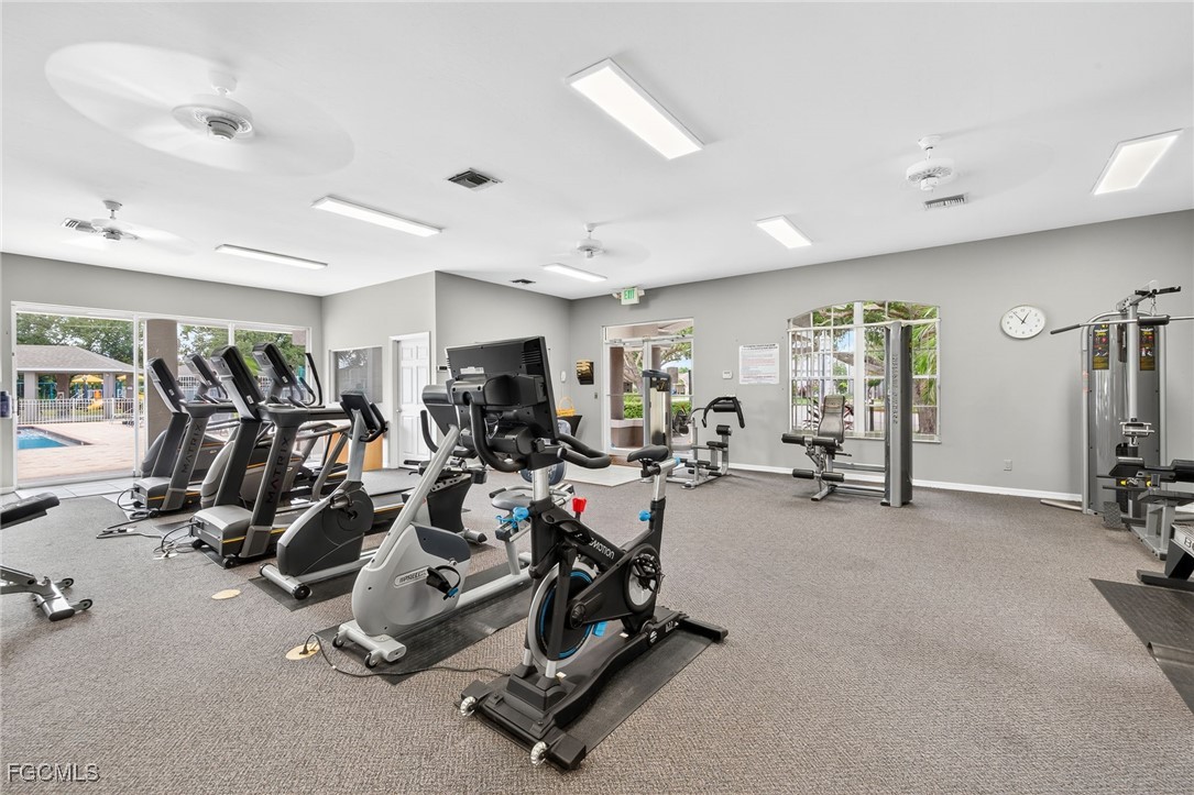 17974 Oakmont Ridge Circle Fort Myers, FL 33967 - Photo 33 of 35 a view of a room with gym equipment