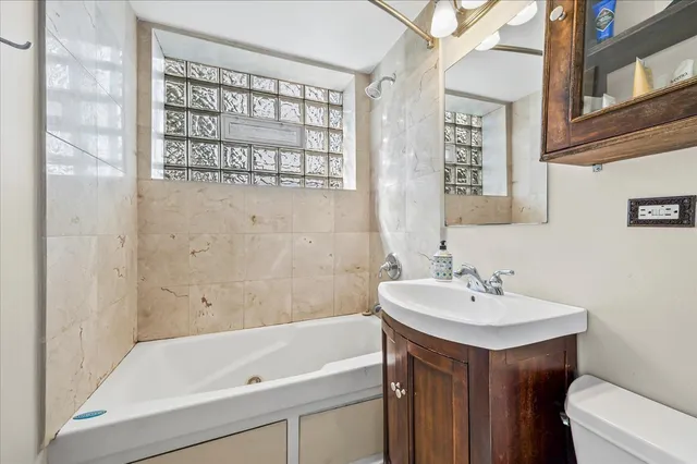a bathroom with a sink and a bathtub