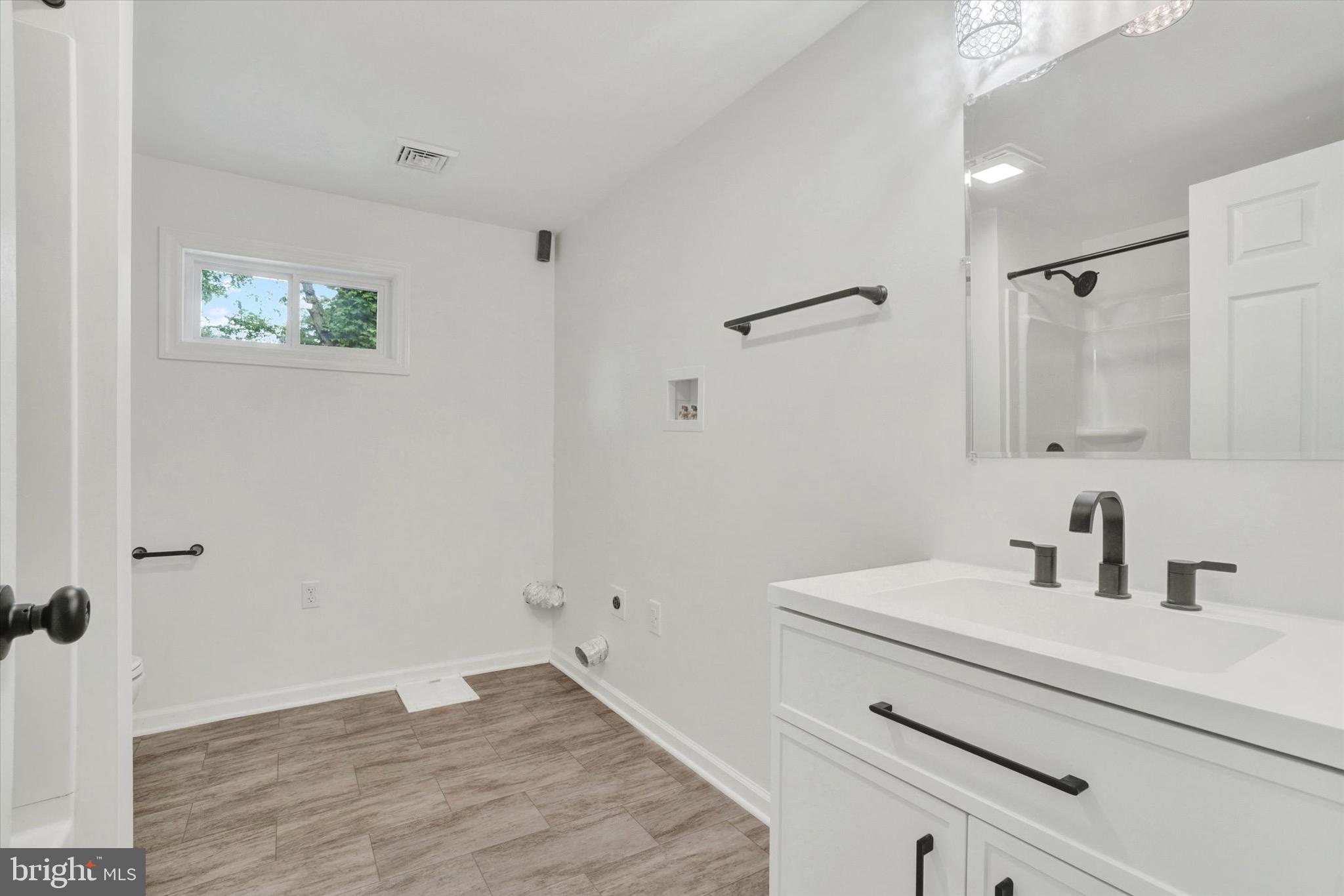 761 2nd Avenue Manchester, PA 17345 - Photo 19 of 29 a bathroom with a sink and a mirror