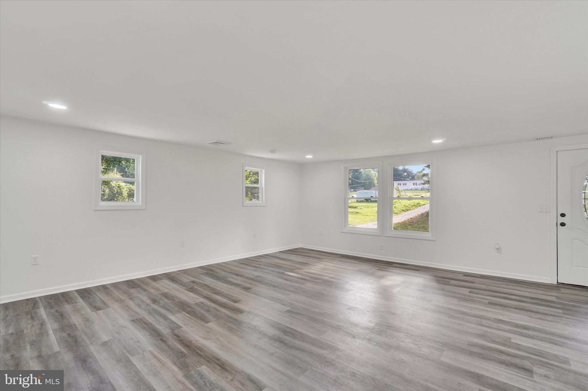 761 2nd Avenue Manchester, PA 17345 - Photo 5 of 29 a view of empty room with wooden floor and fan