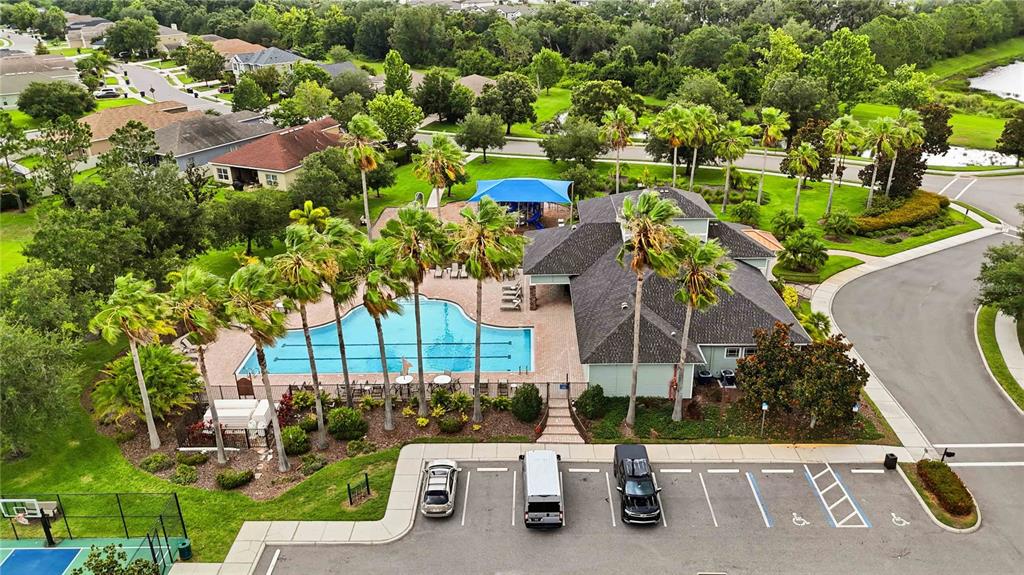 10920 79th Street East Parrish, FL 34219 - Photo 69 of 73 an aerial view of a house with a yard and lake view