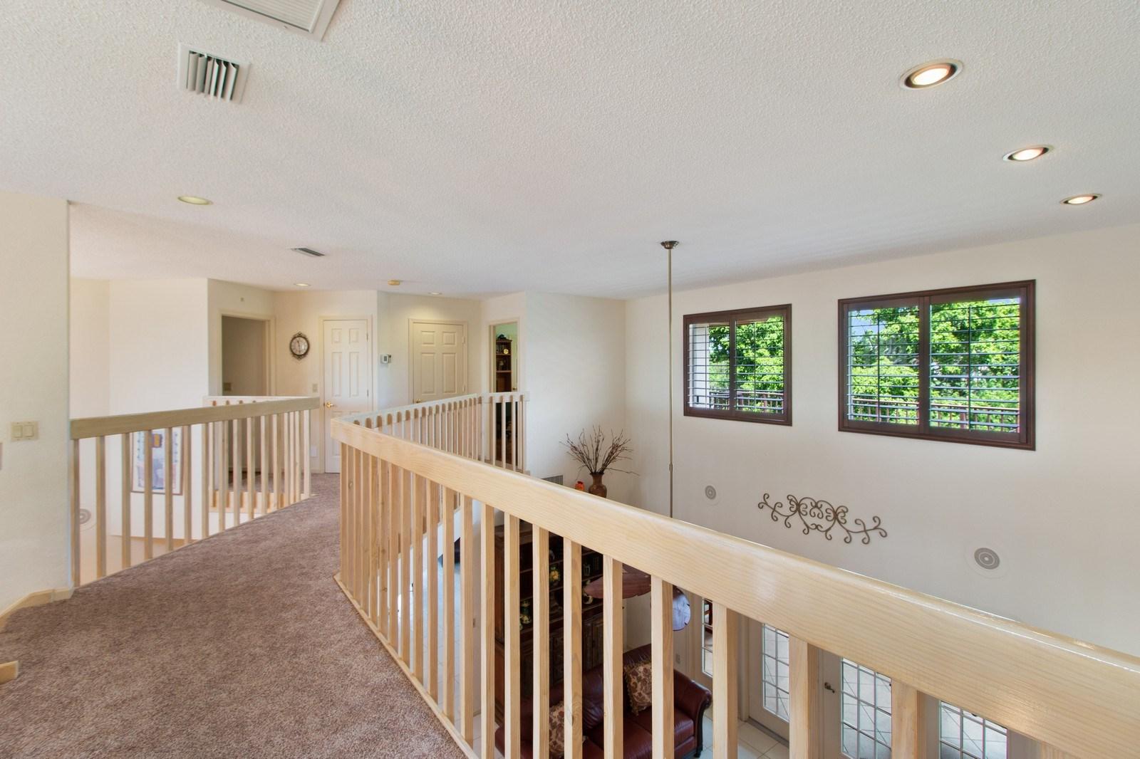 23102 L'Ermitage Circle Boca Raton, FL 33433 - Photo 18 of 34 SPACIOUS UPSTAIRS HALLWAY