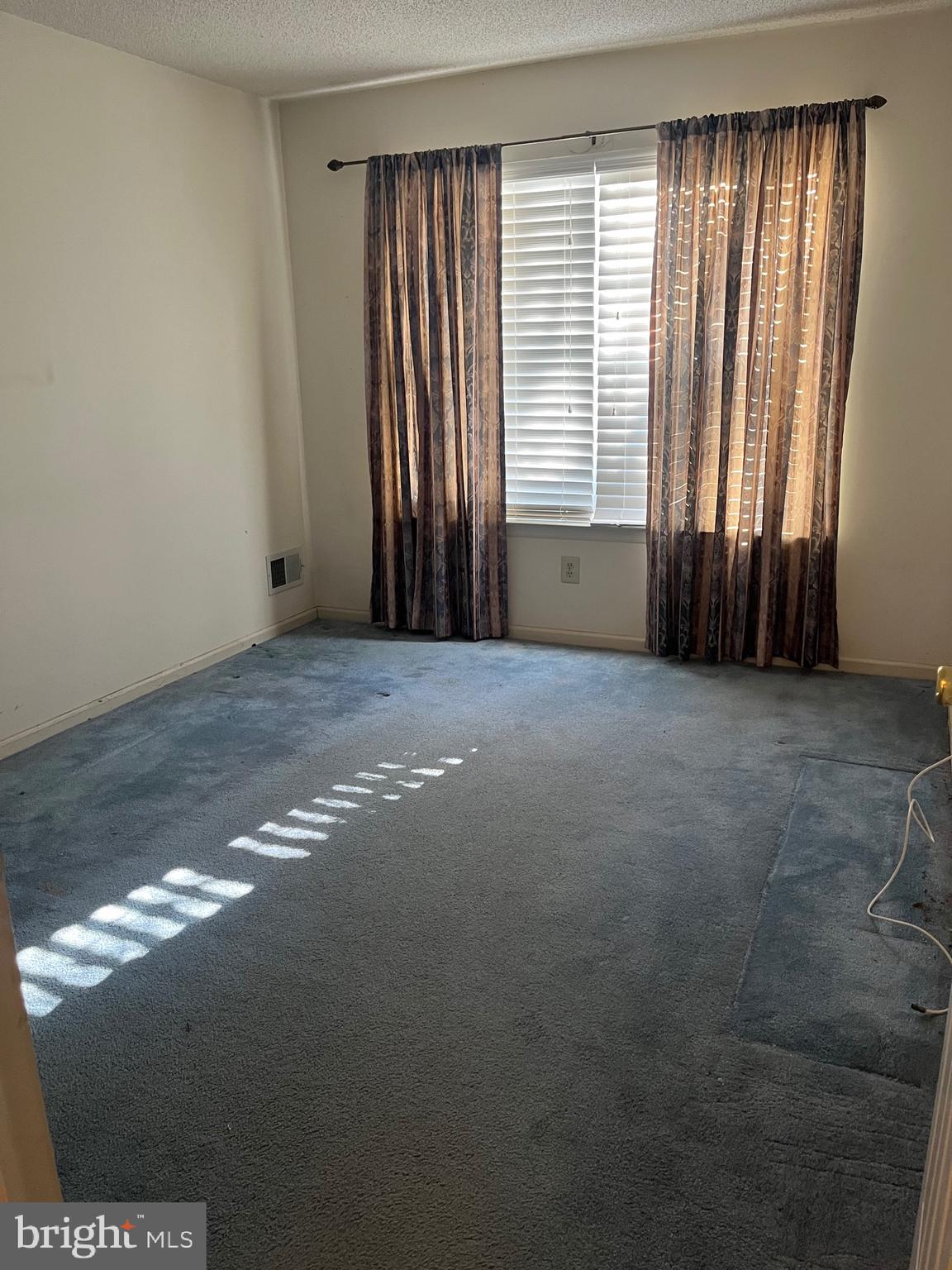 1826 Mansfield Street Hellertown, PA 18055 - Photo 21 of 52 an empty room with windows