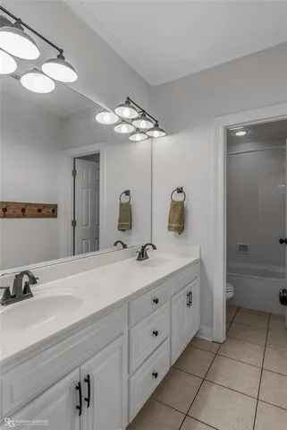 a view of a swimming pool with a yard and sitting area