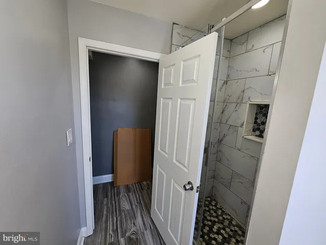 a view of entryway with wooden floor