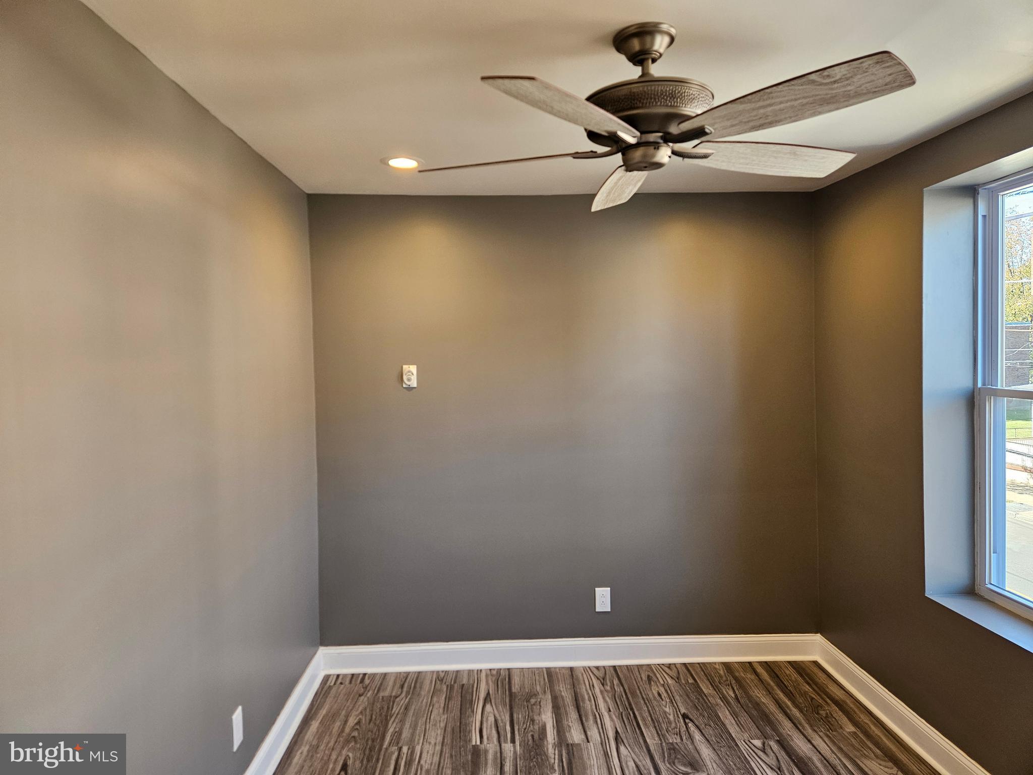 835 East State Street, Unit 2 Trenton, NJ 08609 - Photo 6 of 18 a view of a room with a window and a ceiling fan