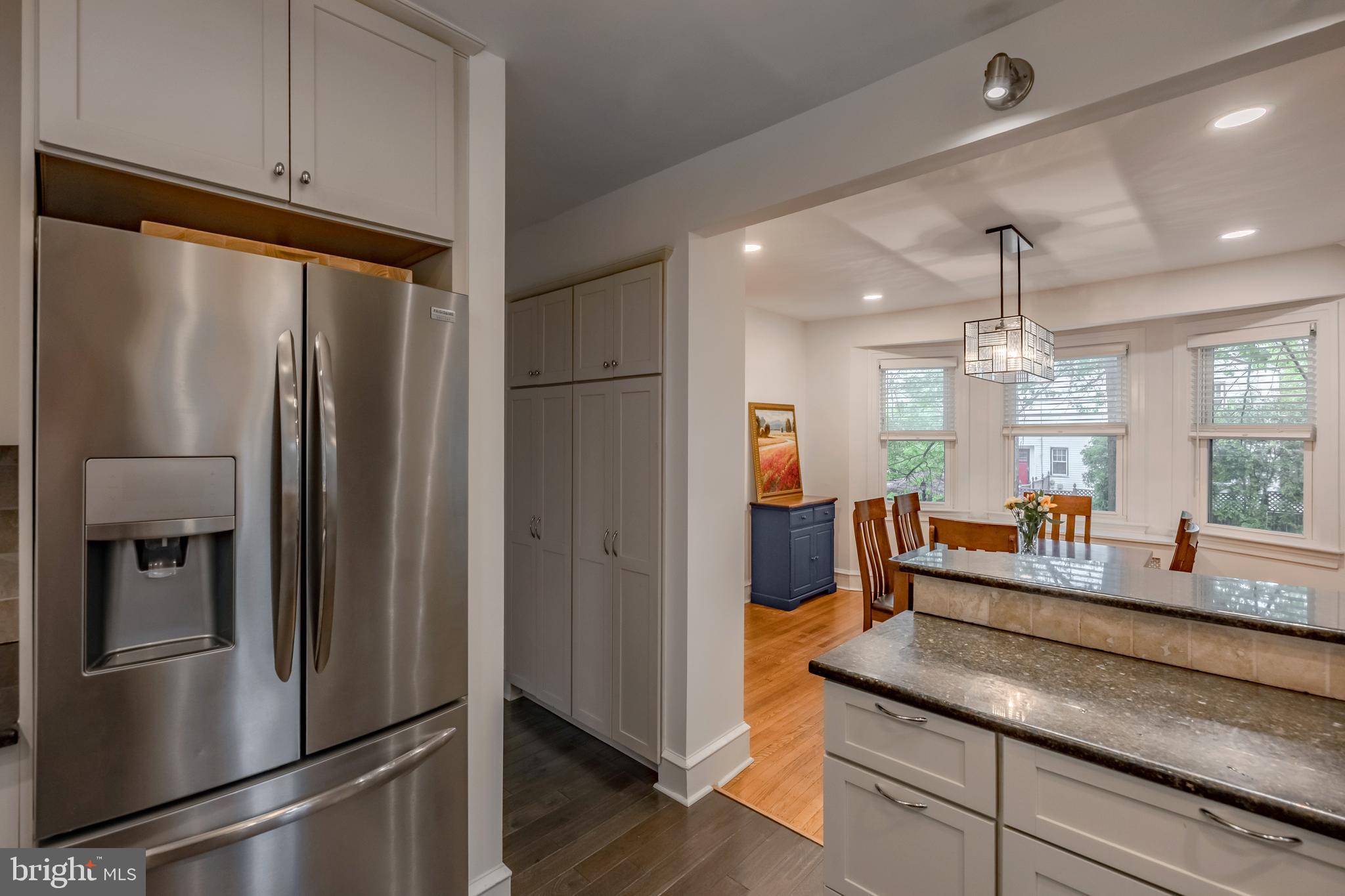 239 Cherry Lane Havertown, PA 19083 - Photo 17 of 49 a kitchen with stainless steel appliances granite countertop a refrigerator and a sink